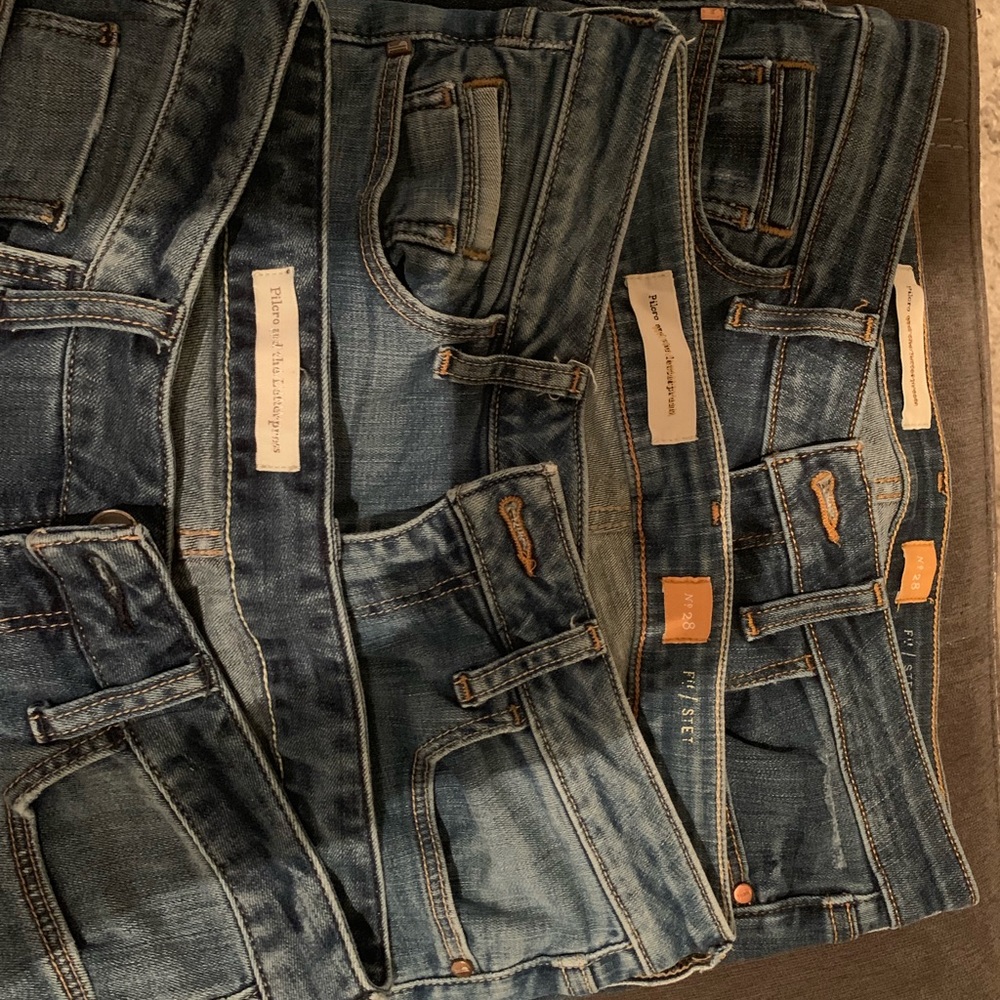 3 pairs of Pilco Letterpress jeans.